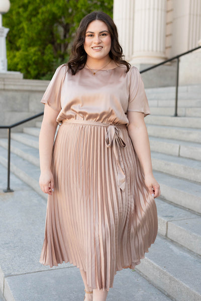 Plus size champagne satin pleat dress with short sleeves