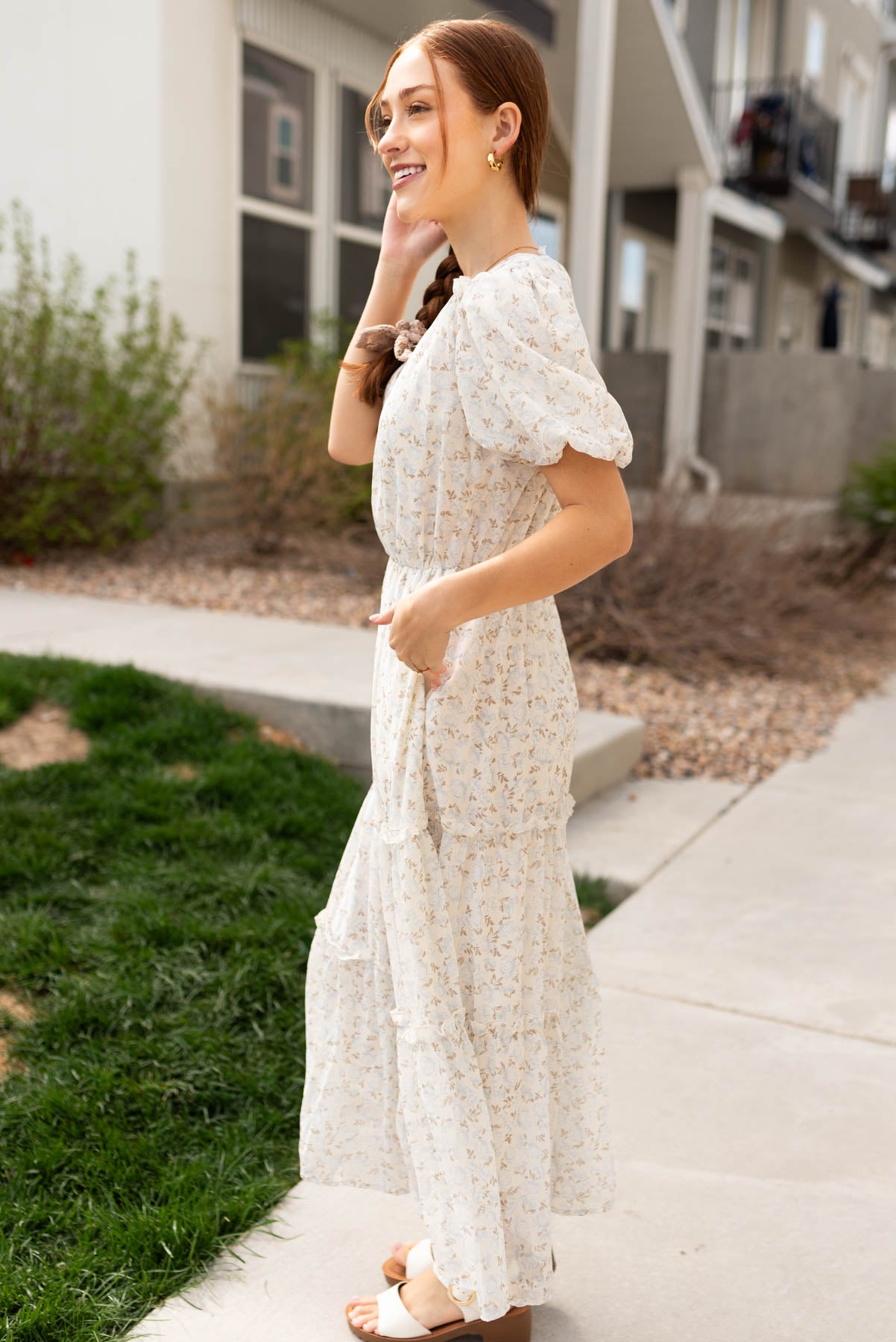 Side view of the dusty blue floral dress