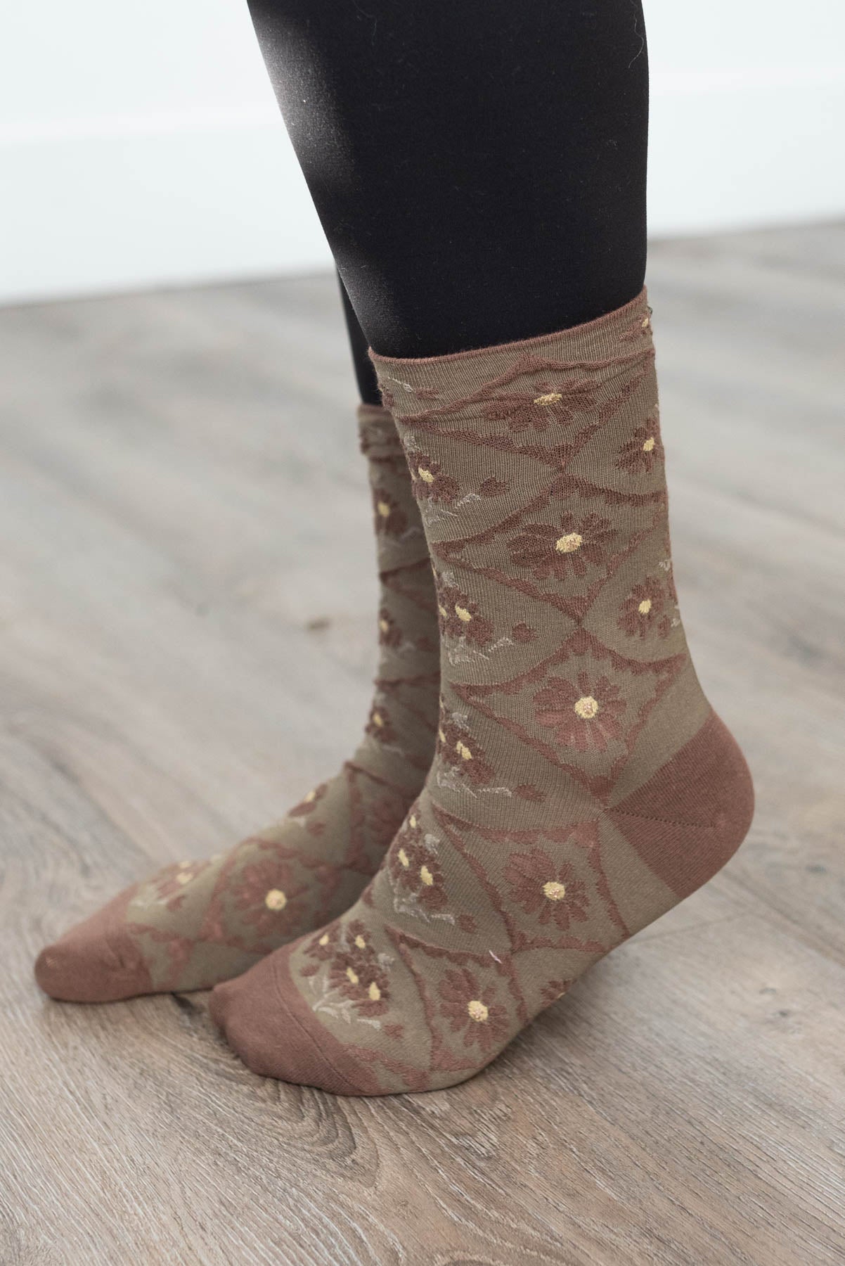 Side view of olive flower socks