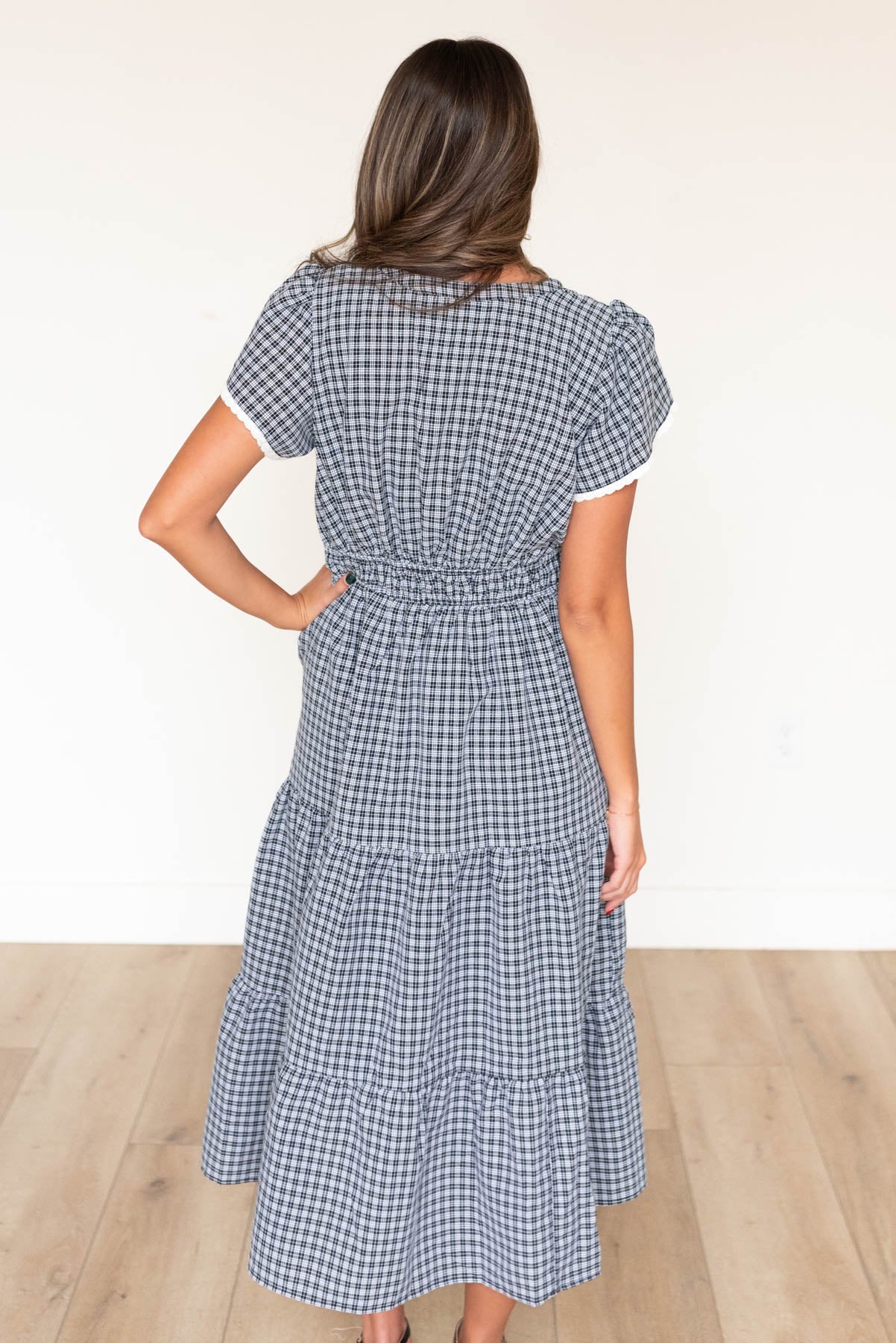 Back view of the black plaid dress