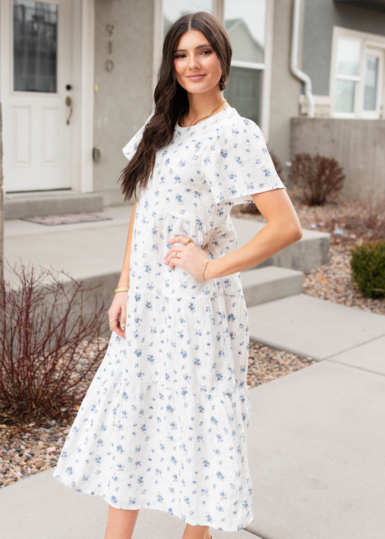 Side view of the blue floral guaze tiered dress