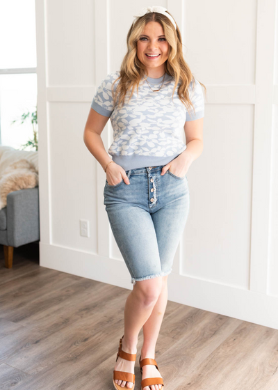 Blue floral knit top with short sleeves