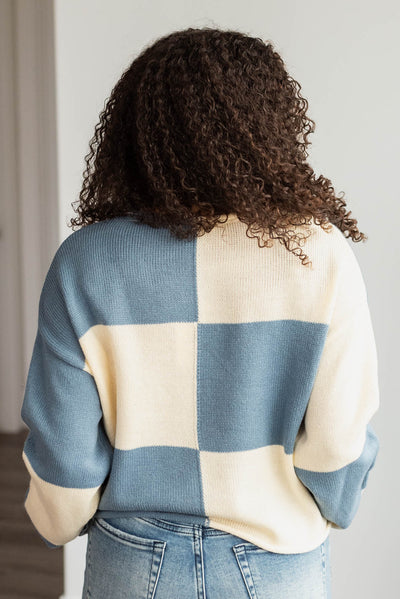 Back view of the blue checkered sweater