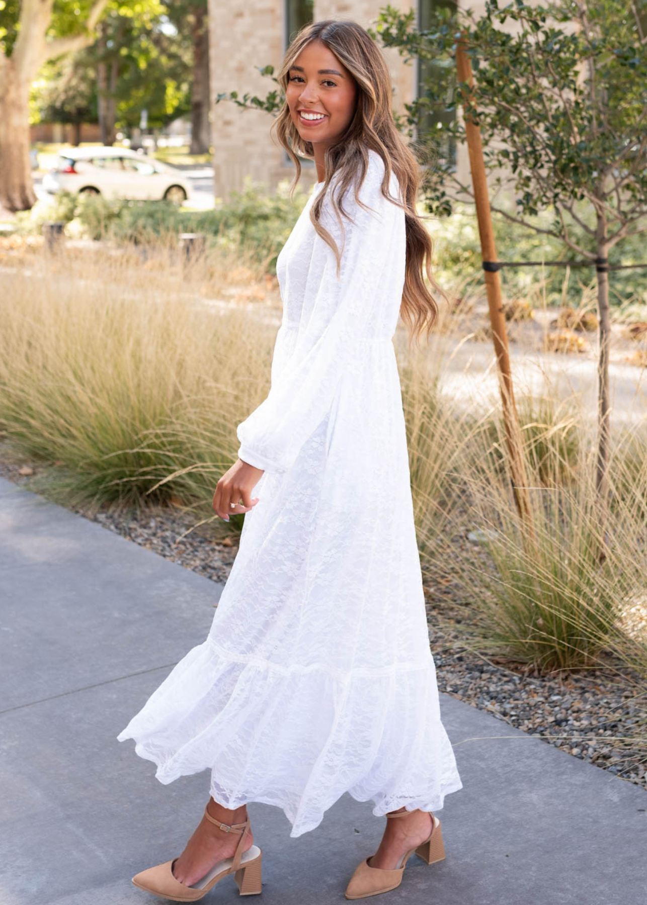 Side view of the white floral lace dress