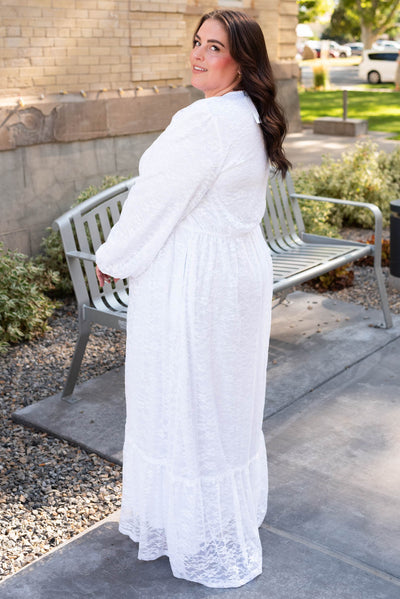 Side view of the plus size white floral lace dress