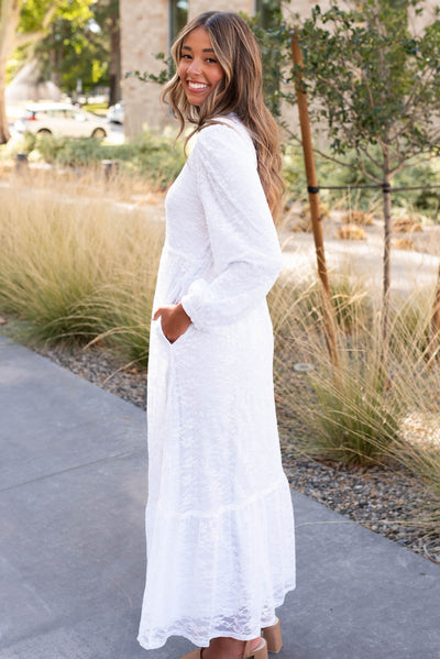 Side view of the white floral lace dress