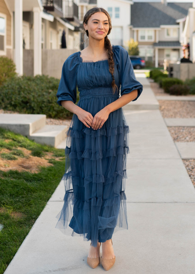 Navy long sleeve ruffle dress with a square neck