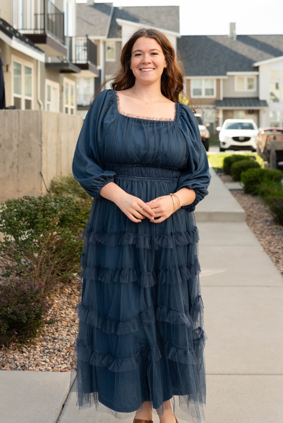 Plus size navy long sleeve ruffle dress with ruffles on the skirt