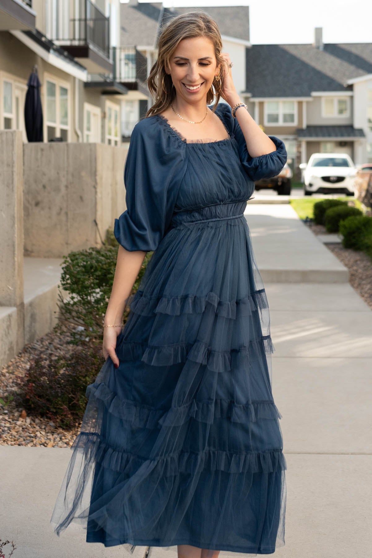 Square neck on the navy long sleeve ruffle dress