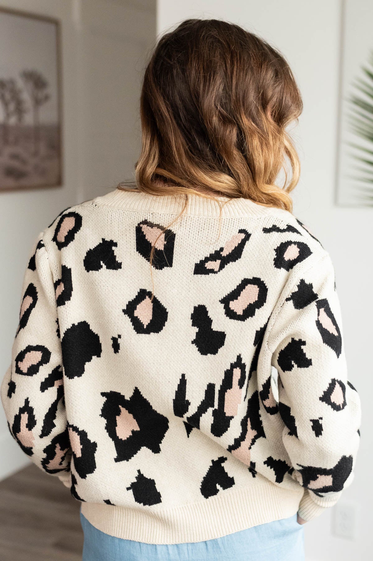 Back view of the cream leopard cardigan