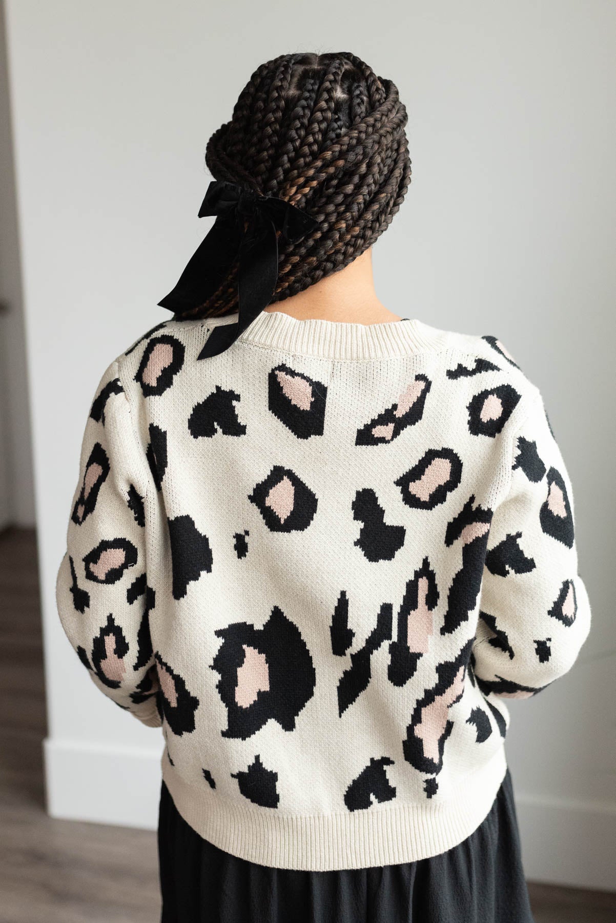 Back view of the cream leopard cardigan