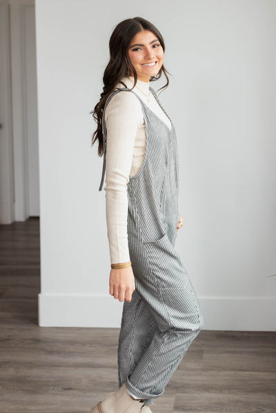 Side view of the charcoal stripe overalls