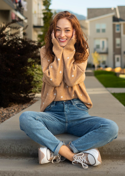 Long sleeve camel sweater with white polka dots