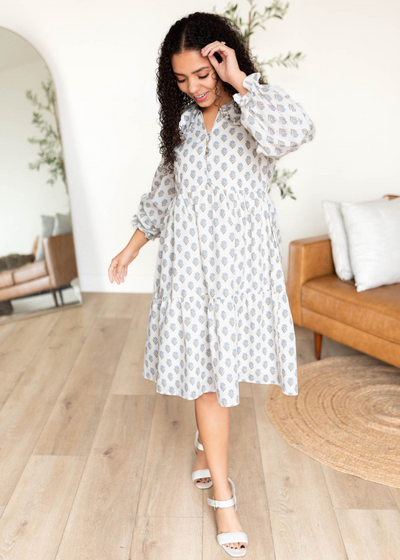 Button bodice blue floral dress