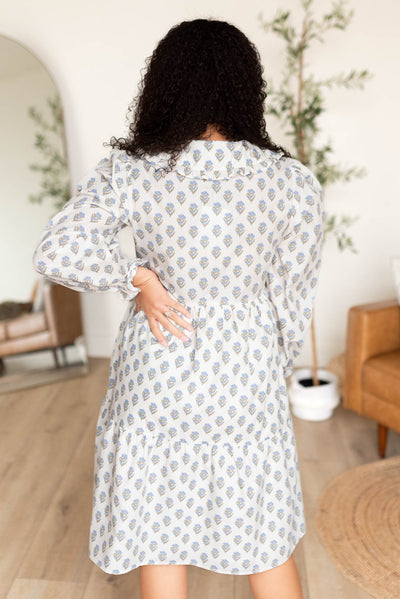 Back view of the blue floral dress