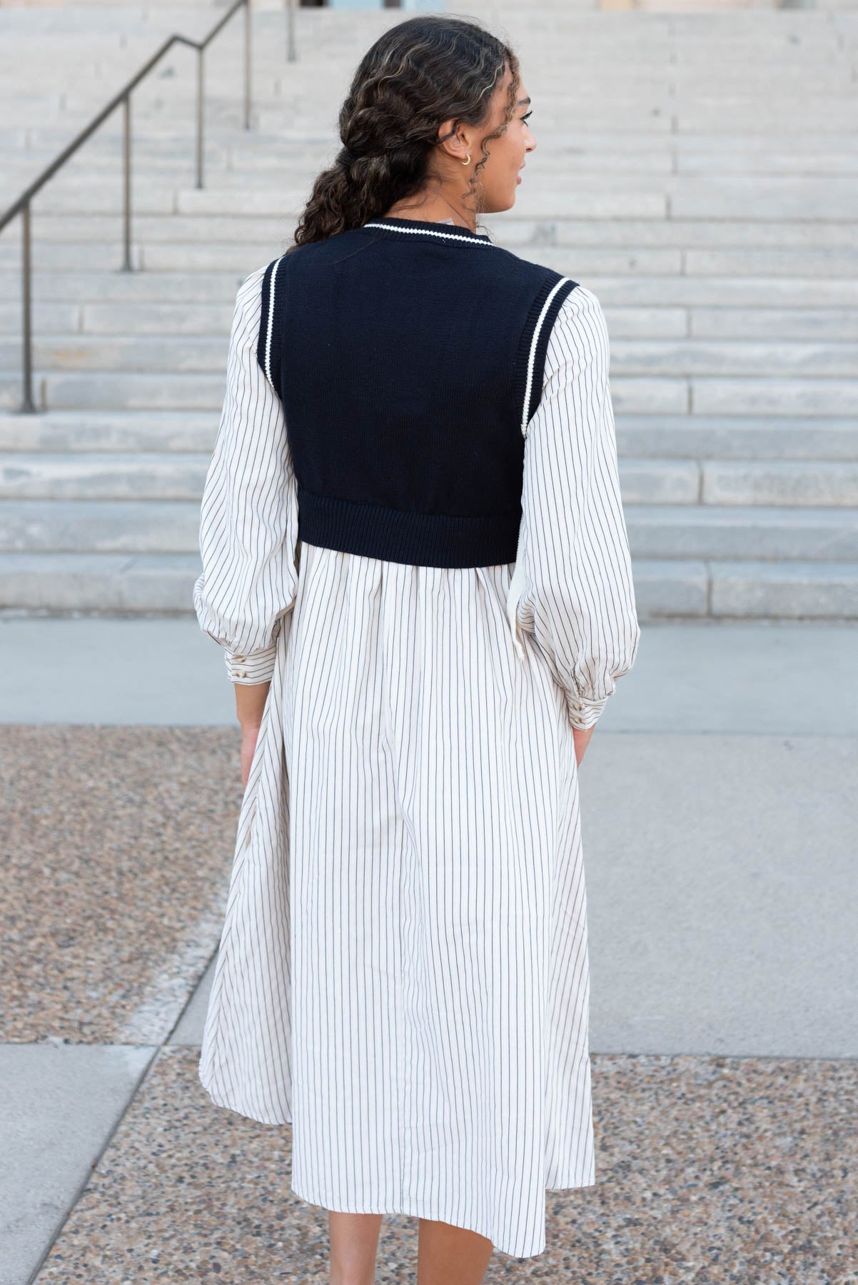 Back view of the navy knit sweater dress