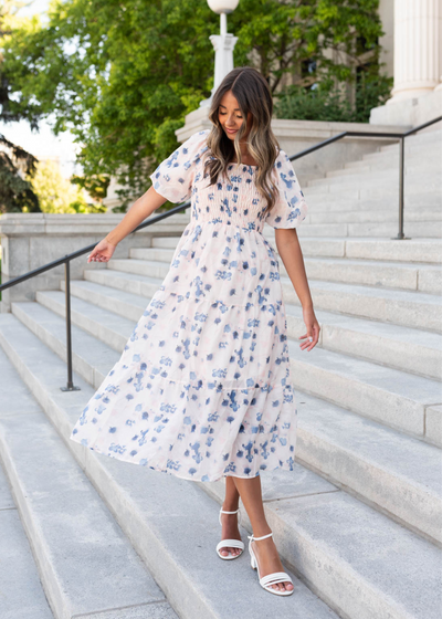 Blue floral smocked dress with short sleeves