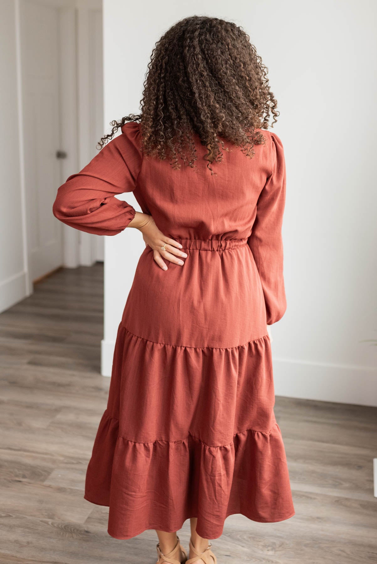 Back view of the burgundy embroidered floral dress