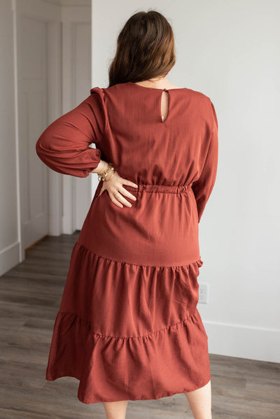 Back view of the plus size burgundy embroidered floral dress