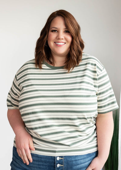 Front view of the plus size jade stripe top