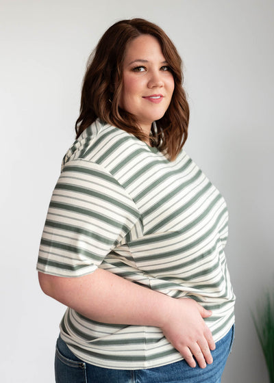 Side view of the plus size jade stripe top