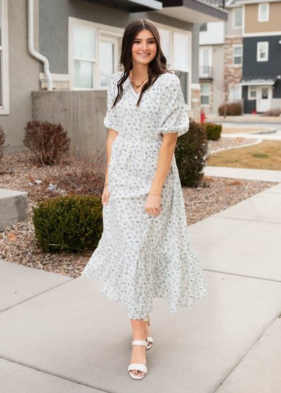 Blue floral dress with a v-neck and short sleeves