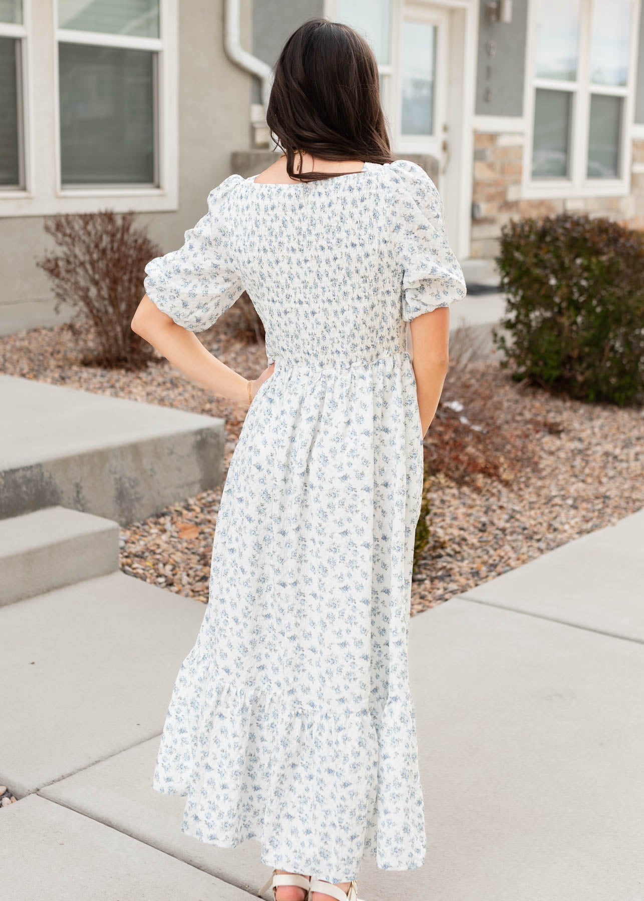 Back view of the blue floral dress