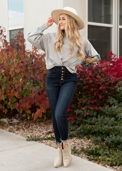 Grey patterned long sleeve shirt with the pattern on the sleeves