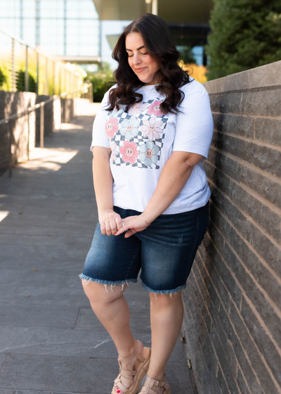 Plus size ash grey floral grid top with smiling flowers