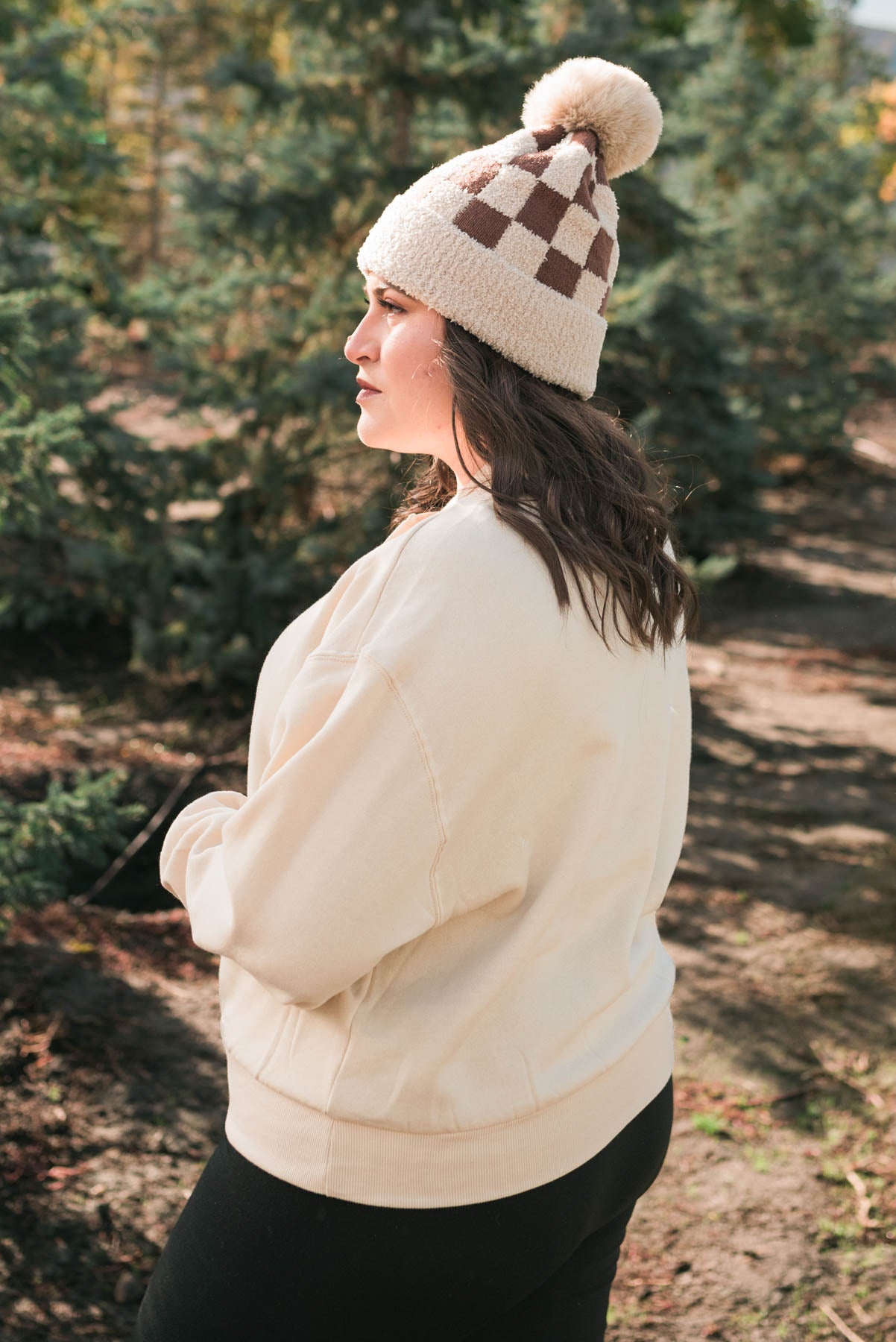 Side view of a cream fleece sweatshirt