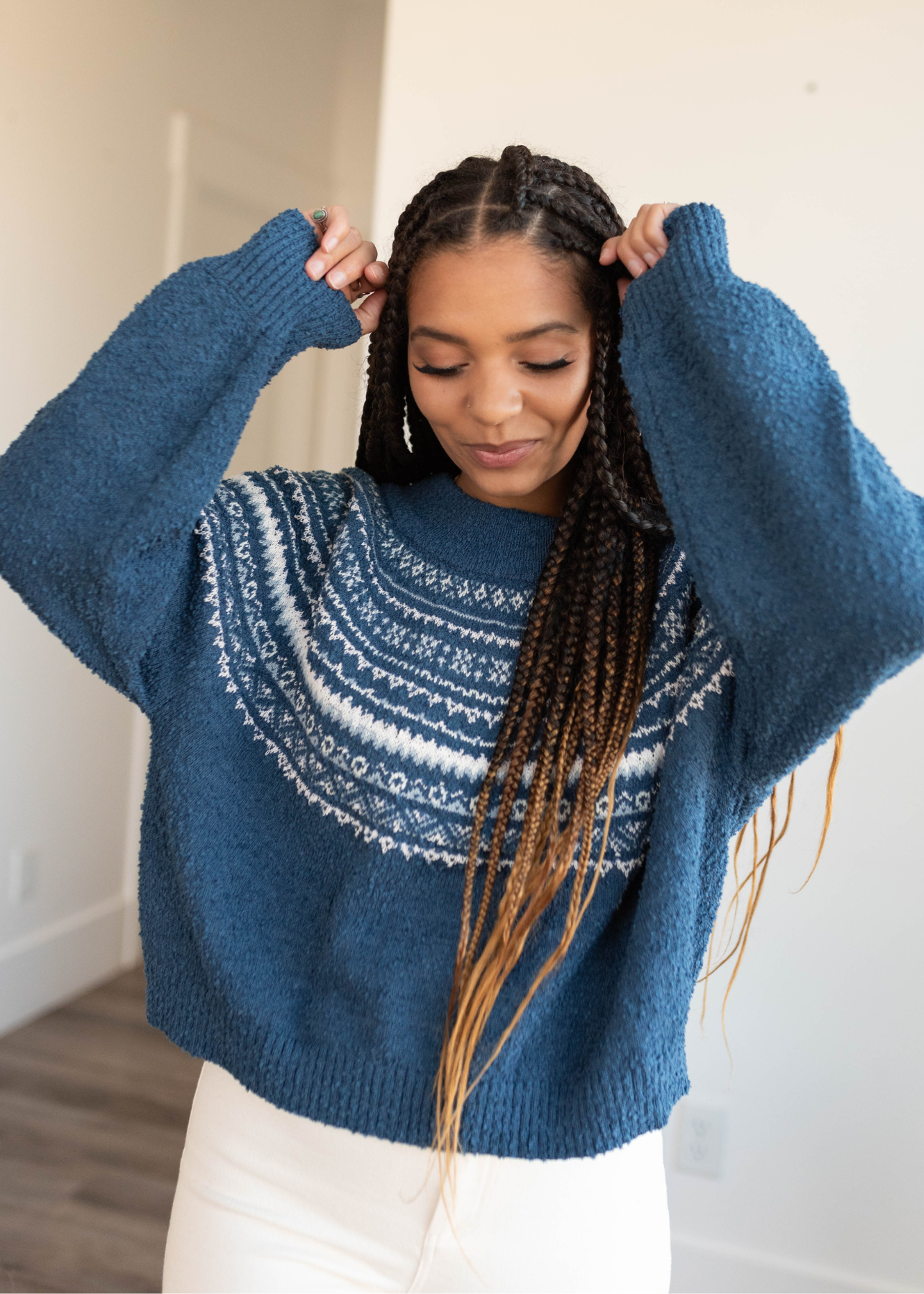 Navy knit sweater with long sleeves