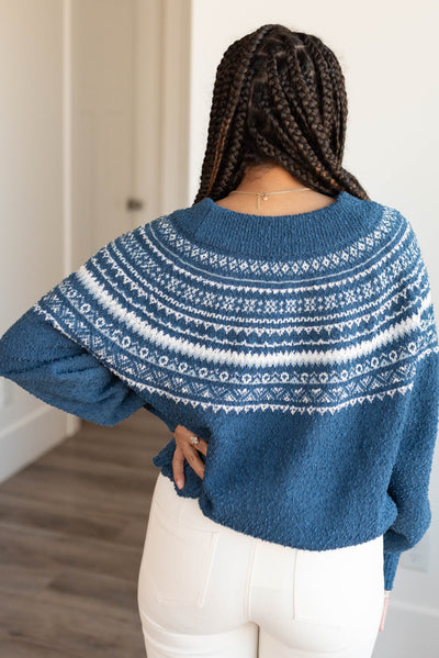 Back view of athe navy knit sweater