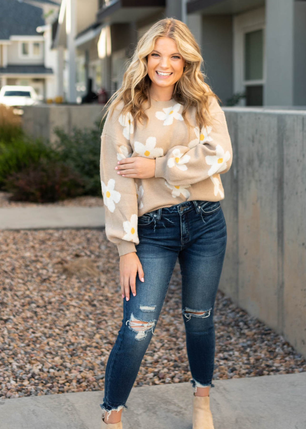 Beige sweater with daisy print