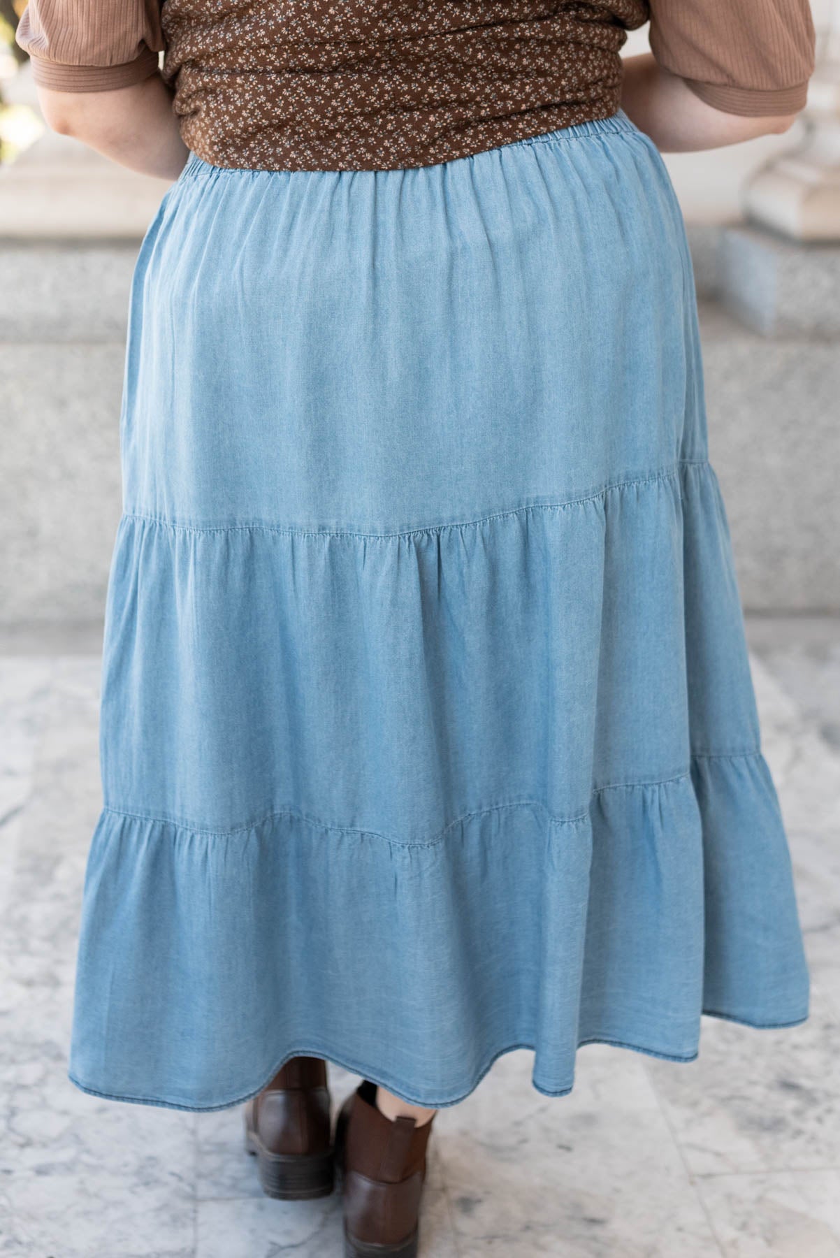 Back view of the plus size denim tiered skirt