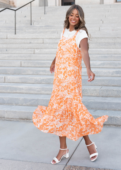 Sleeveless orange floral strap dress