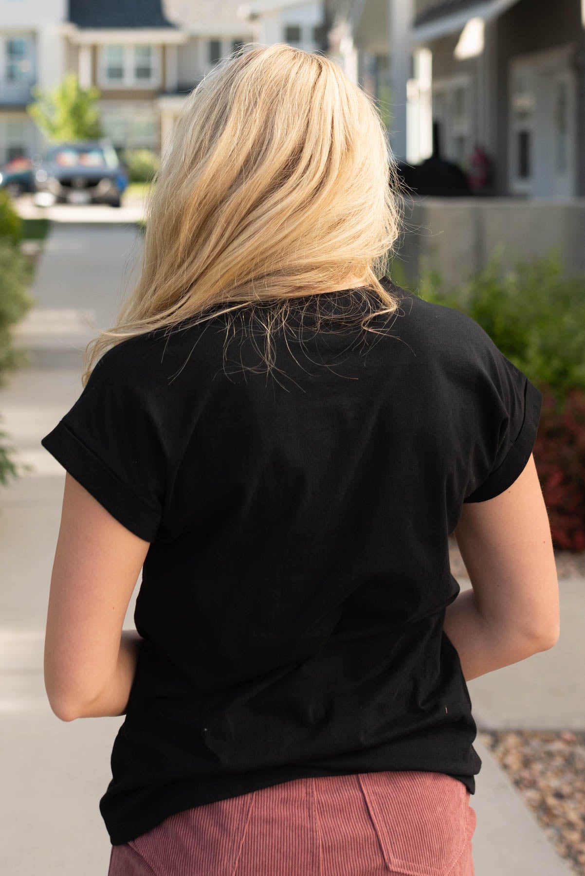 Back view of the black folded sleeve top