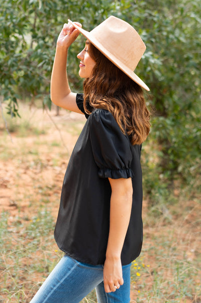 Side view of a black top