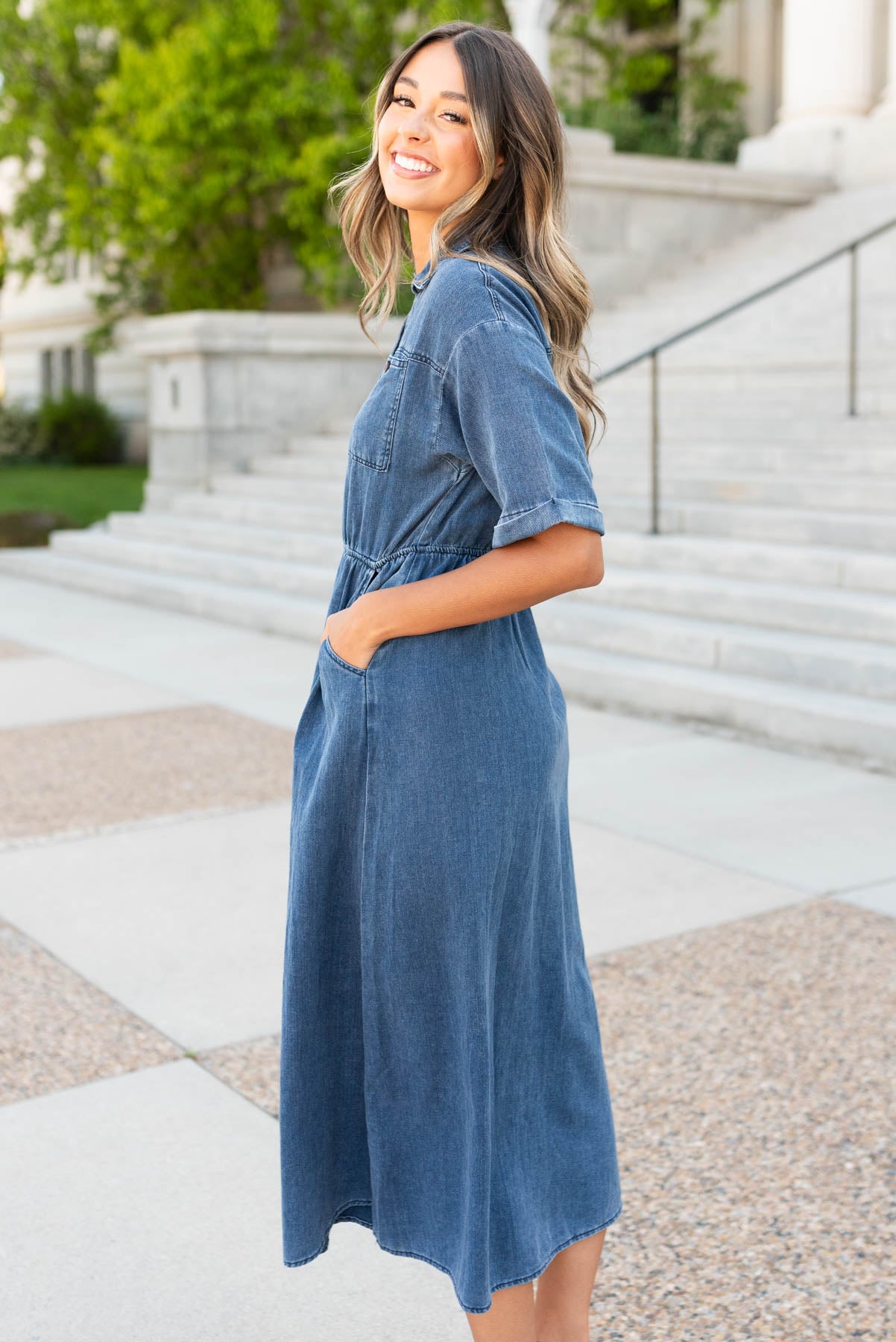 Side view of the denim button down dress