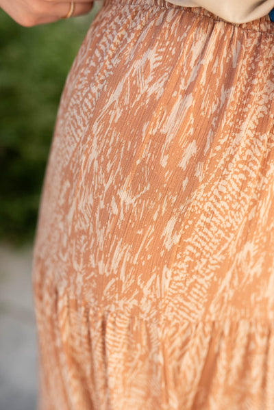 Close up of the fabric on the terracotta pattern skirt