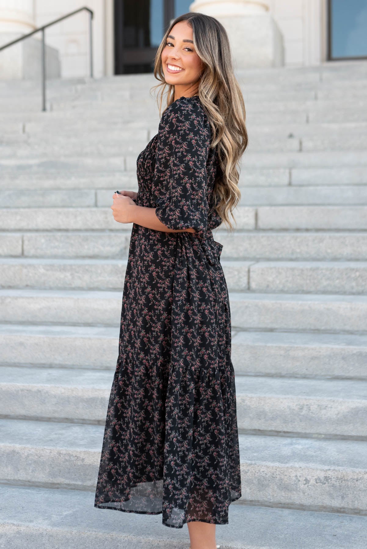 Side view of the black pink flower dress