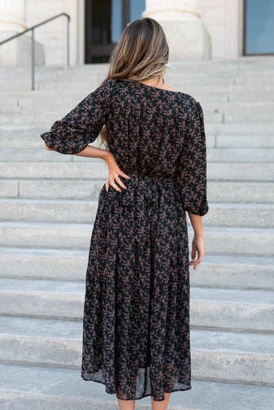 Back view of the black pink flower dress with a in the back