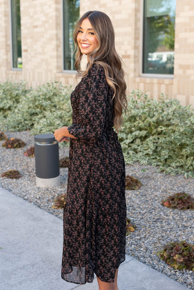 Side view of the black pink flower dress