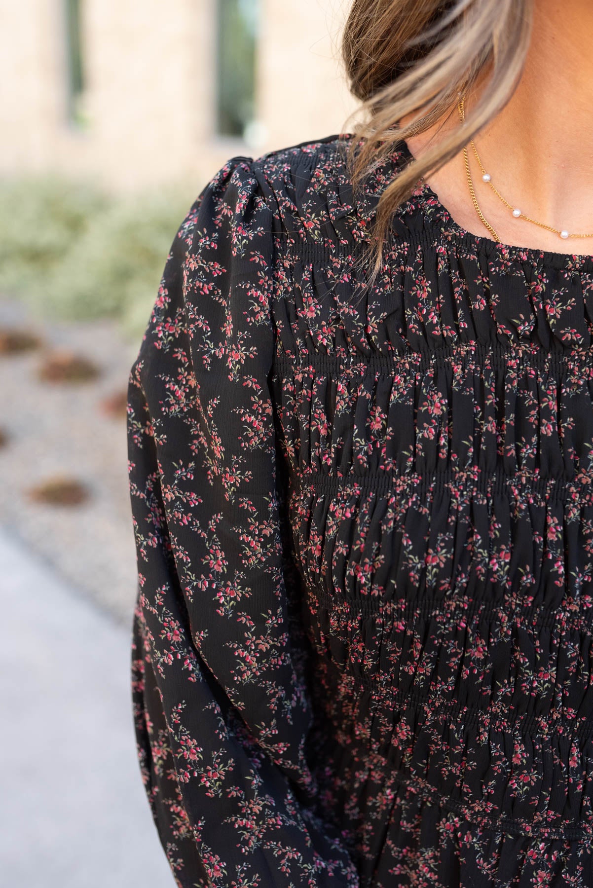 Close up of the fabric on the black pink flower dress