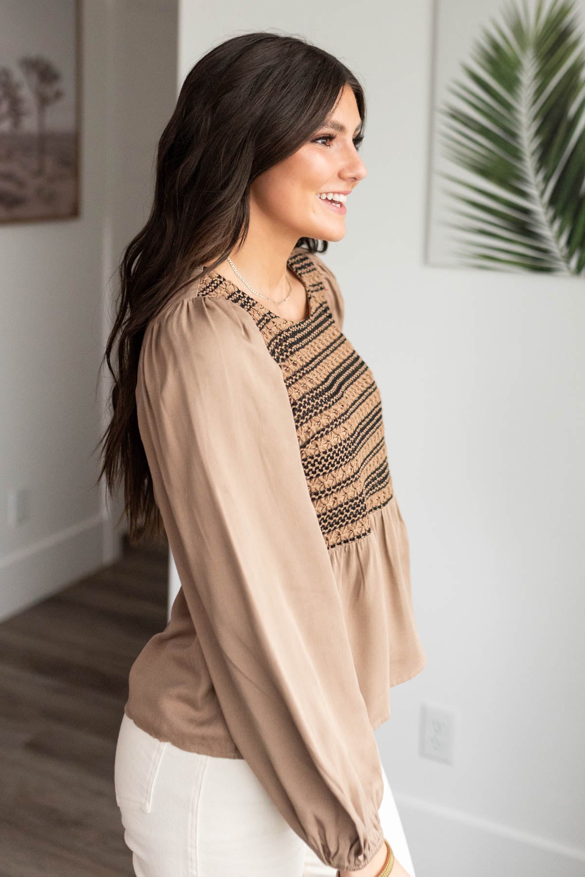 Side view of the mocha crochet stripe top