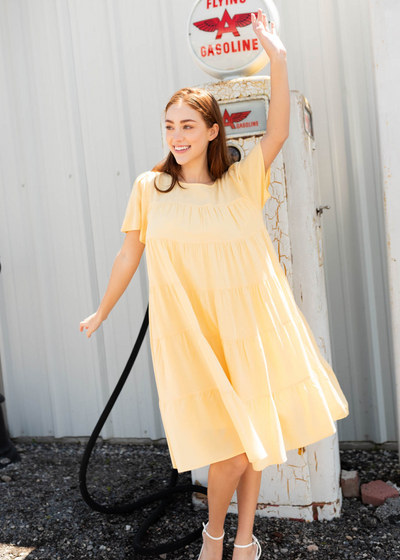 Short sleeve light yellow tiered dress