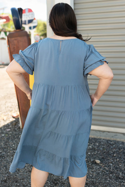 Back view of the plus size navy tiered dress