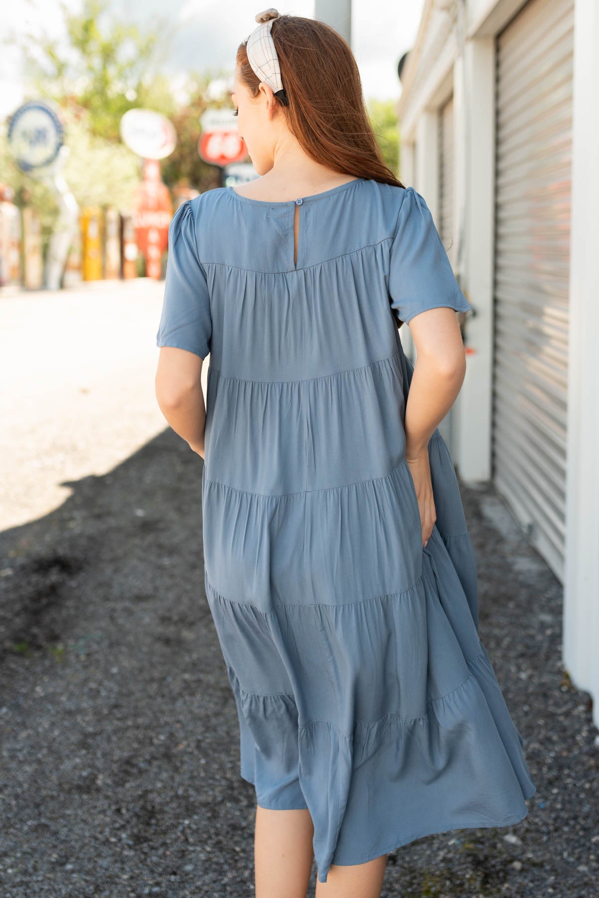 Back view of the navy tiered dress