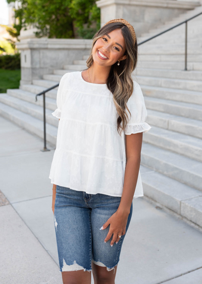 White floral ruffle top with short sleeves