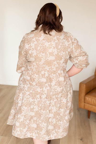 Back view of the plus size taupe floral button down dress