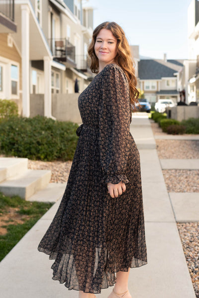 Side view of the navy multi floral dress